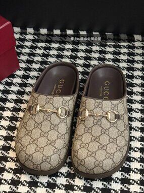 Gucci Monogram Mules with Gold Accents